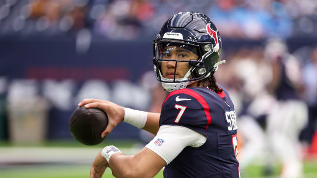 Texans quarterback C.J. Stroud (7) warms up before playing against the Tennessee Titans at NRG Stadium.
